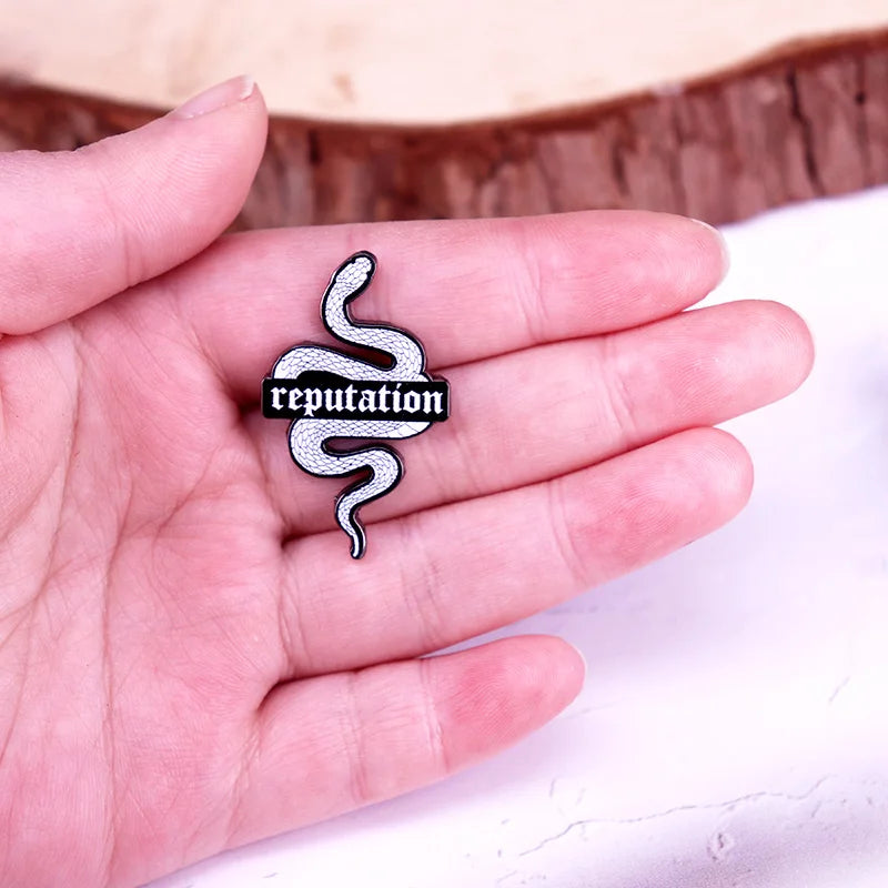 Snake Reputation Enamel brooch