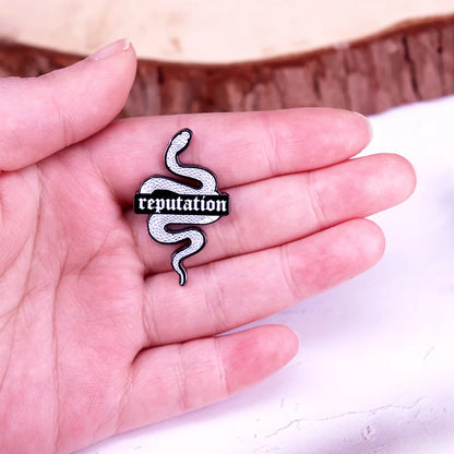 Snake Reputation Enamel brooch
